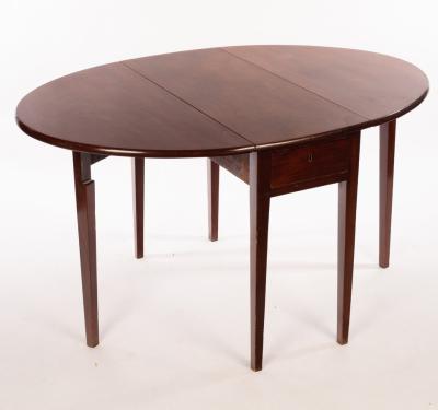 A George III mahogany oval two-flap