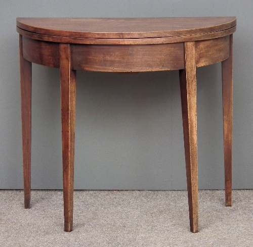 A George III mahogany semi-circular