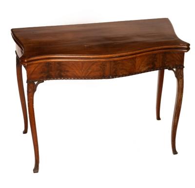 A George III mahogany serpentine