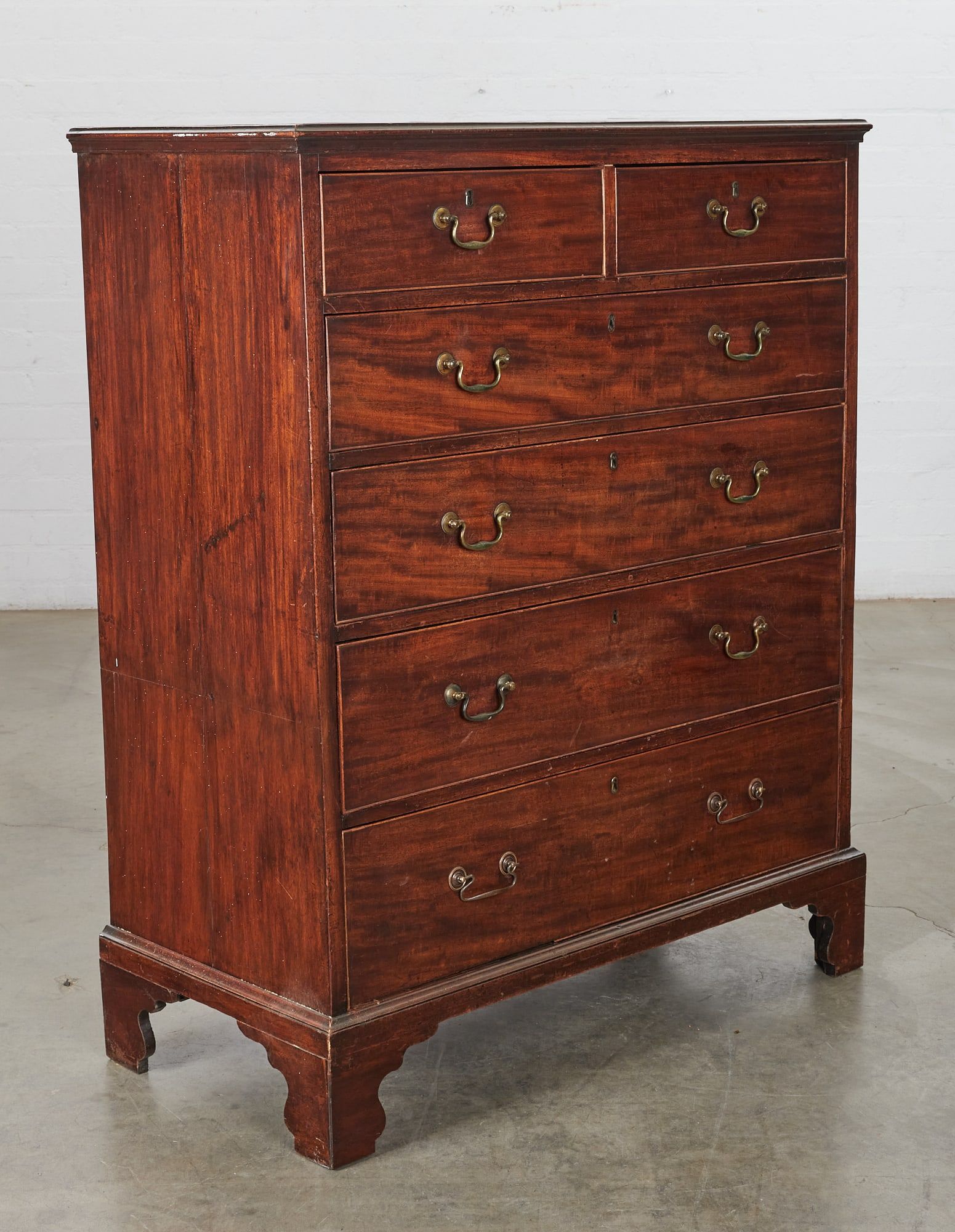 A GEORGE III MAHOGANY TALL CHEST OF
