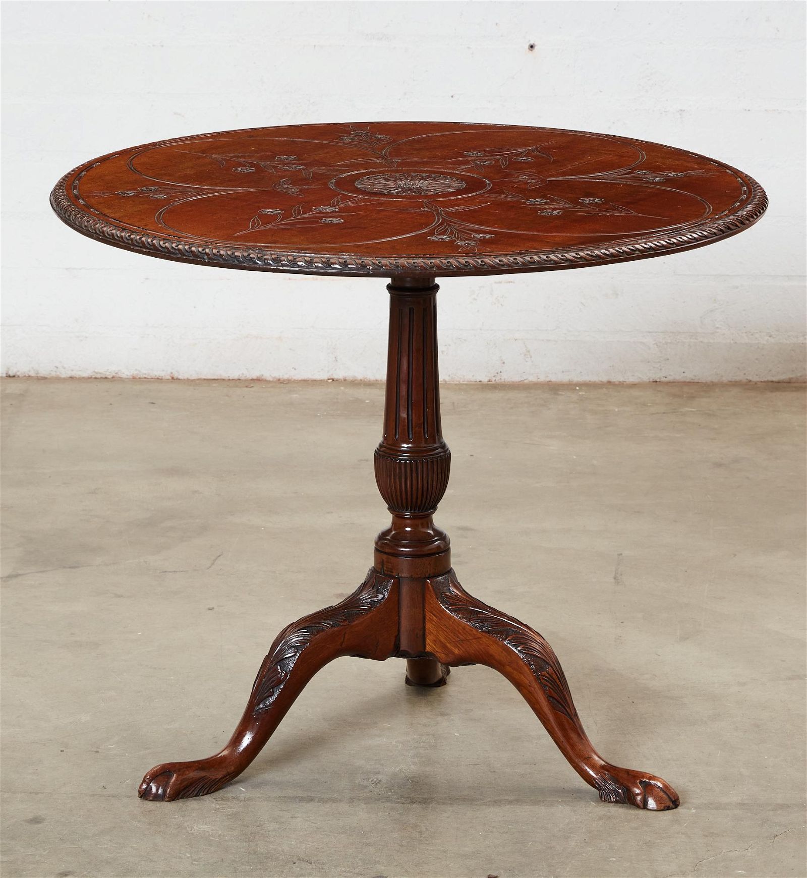 A GEORGE III MAHOGANY TILT TOP