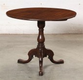 A GEORGE III MAHOGANY TILT TOP