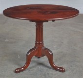 A GEORGE III MAHOGANY TILT TOP
