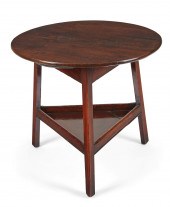 A GEORGE III OAK CRICKET TABLE