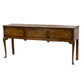 A GEORGE III OAK DRESSER, LATE