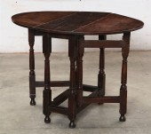 A GEORGE III OAK GATELEG TABLE