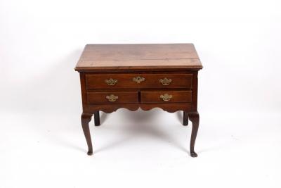 A George III oak lowboy with