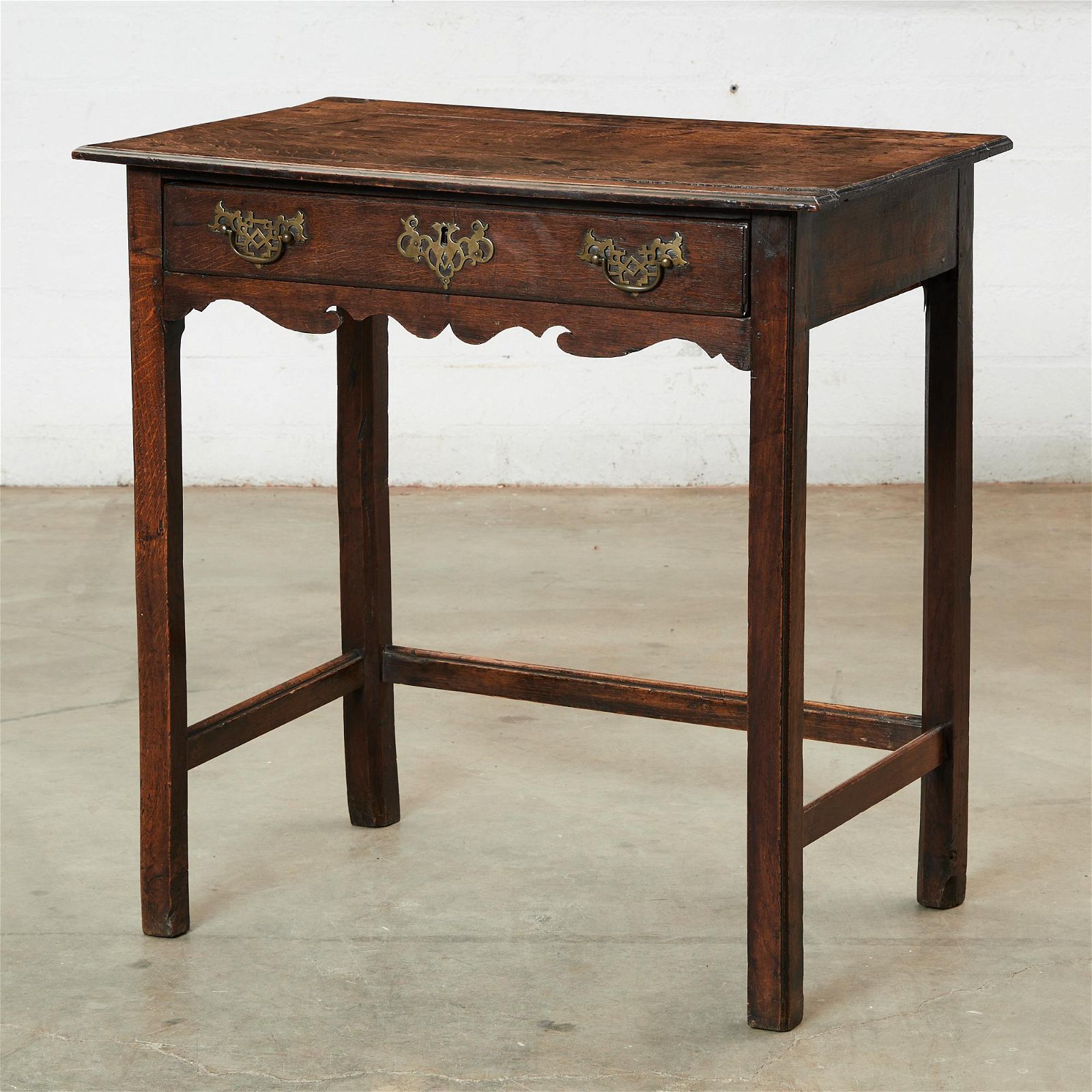 A GEORGE III OAK SIDE TABLEA George