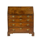 A GEORGE III OAK SLANT FRONT D