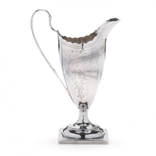 A GEORGE III SILVER CREAM JUG, MARK