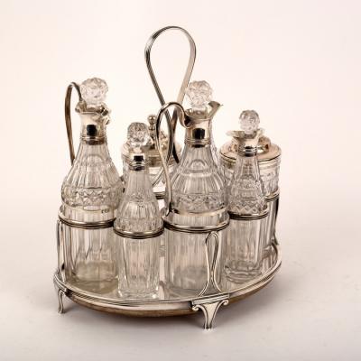 A George III silver cruet stand,
