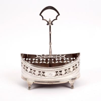 A George III silver cruet stand,