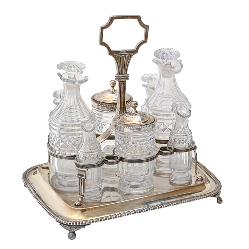 A George III silver cruet frame,