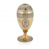A GEORGE III SILVER-GILT CASTE