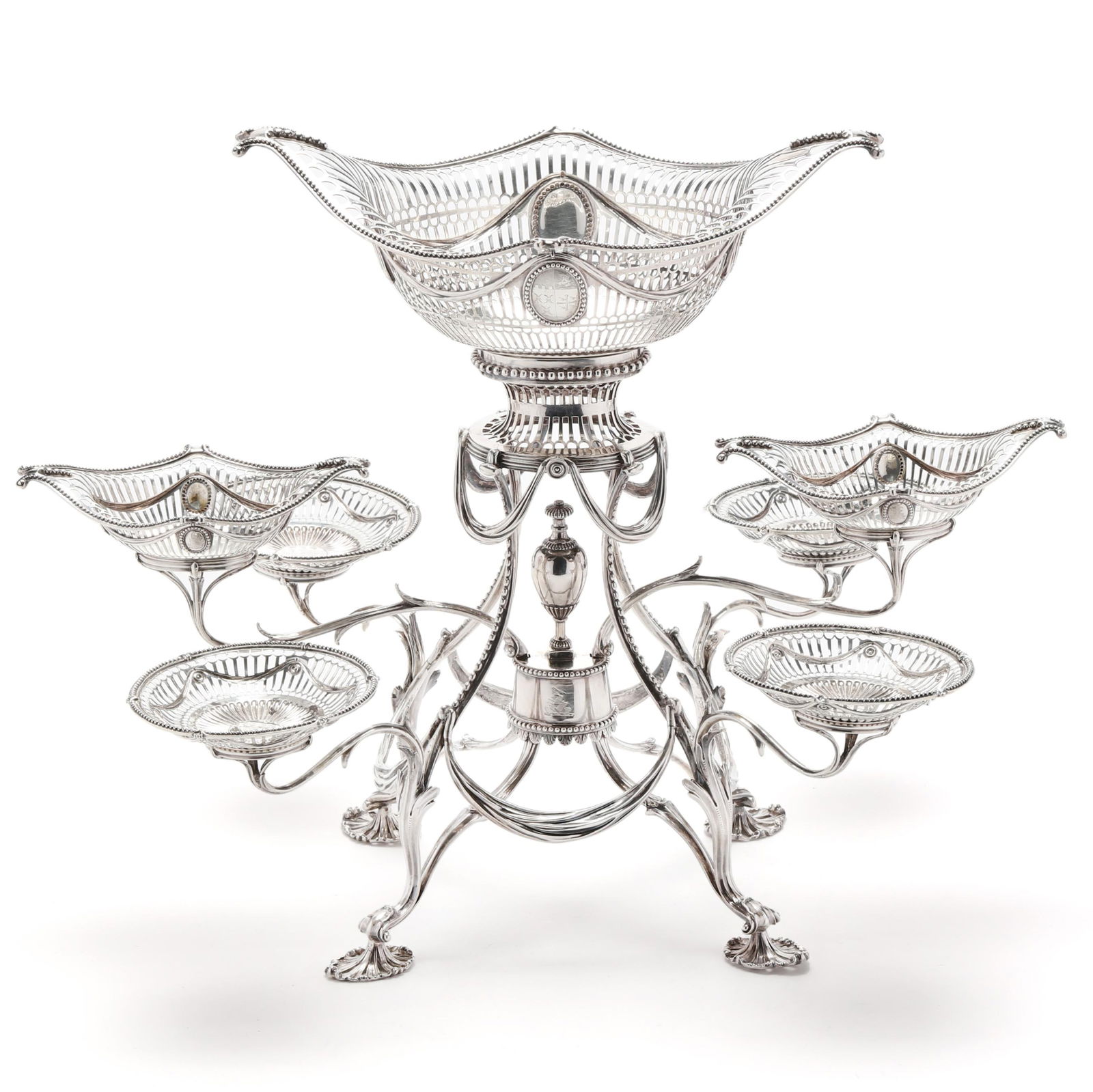 A GEORGE III SILVER SEVEN-BASKET