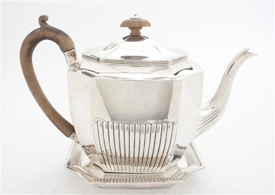 A George III Silver Teapot on Stand