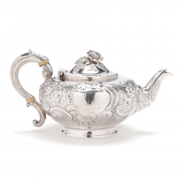 A GEORGE III SILVER TEAPOT London