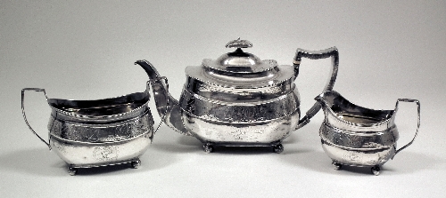 A George III silver three piece tea