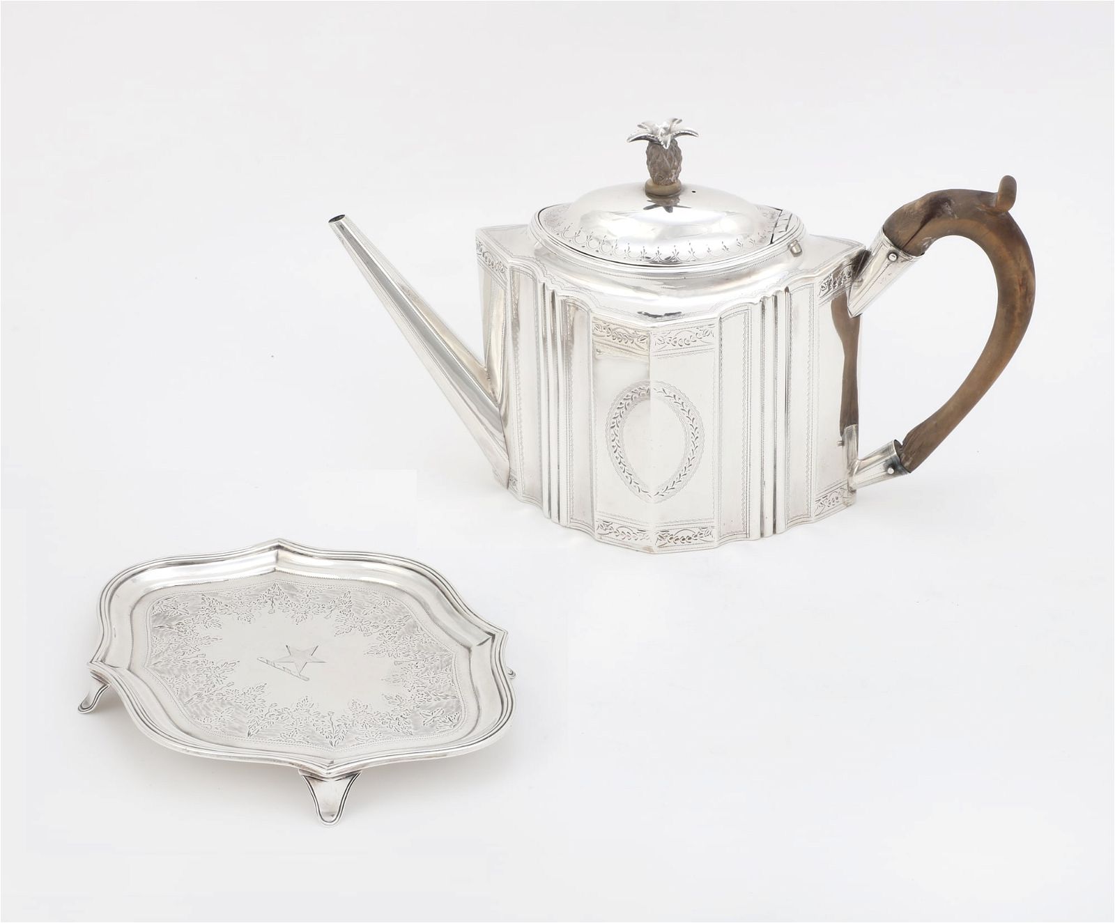 A GEORGE III STERLING SILVER TEAPOT
