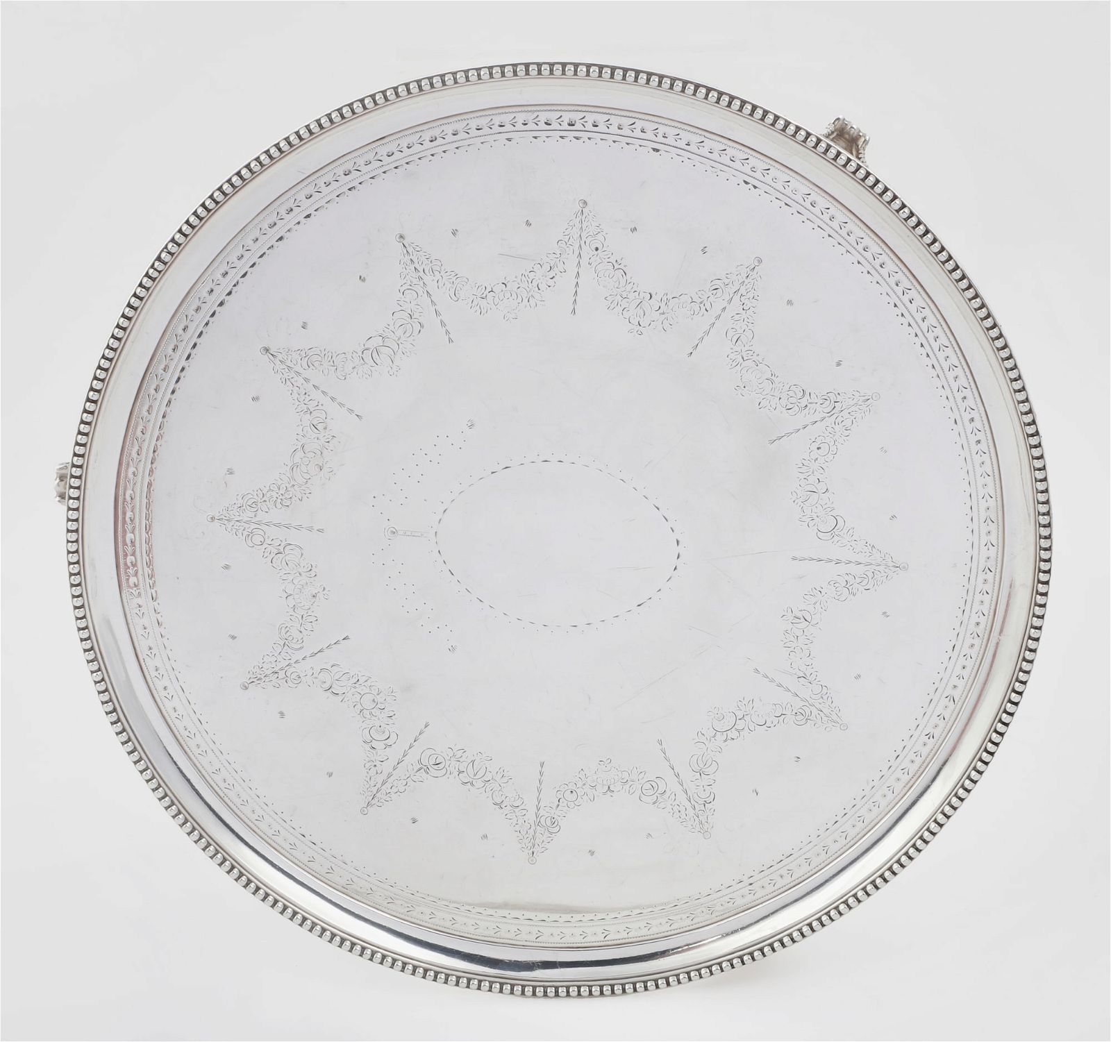 A GEORGE III STERLING SILVER FOOTED