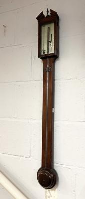 A George III stick barometer, the
