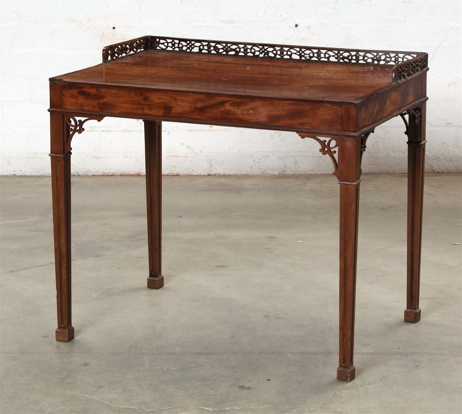 A GEORGE III STYLE  MAHOGANY SILVER