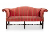 A GEORGE III STYLE UPHOLSTERED