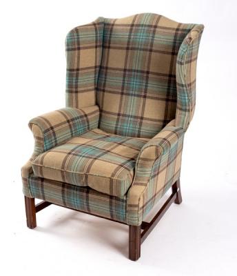A George III style wing armchair