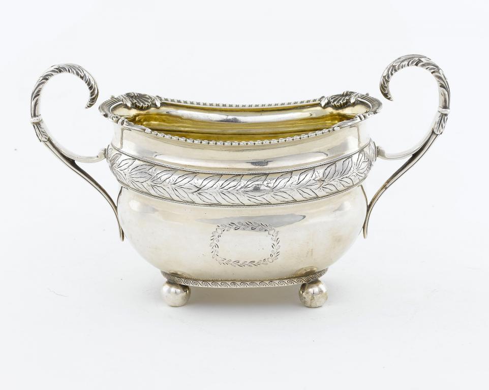 A GEORGE III SUGAR BOWL the rim