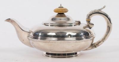 A George IV silver teapot,