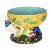 A GEORGE JONES MAJOLICA FIGURA