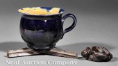 A George Ohr Humorous Tea Cup
