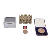 A George V prize medal, Nation