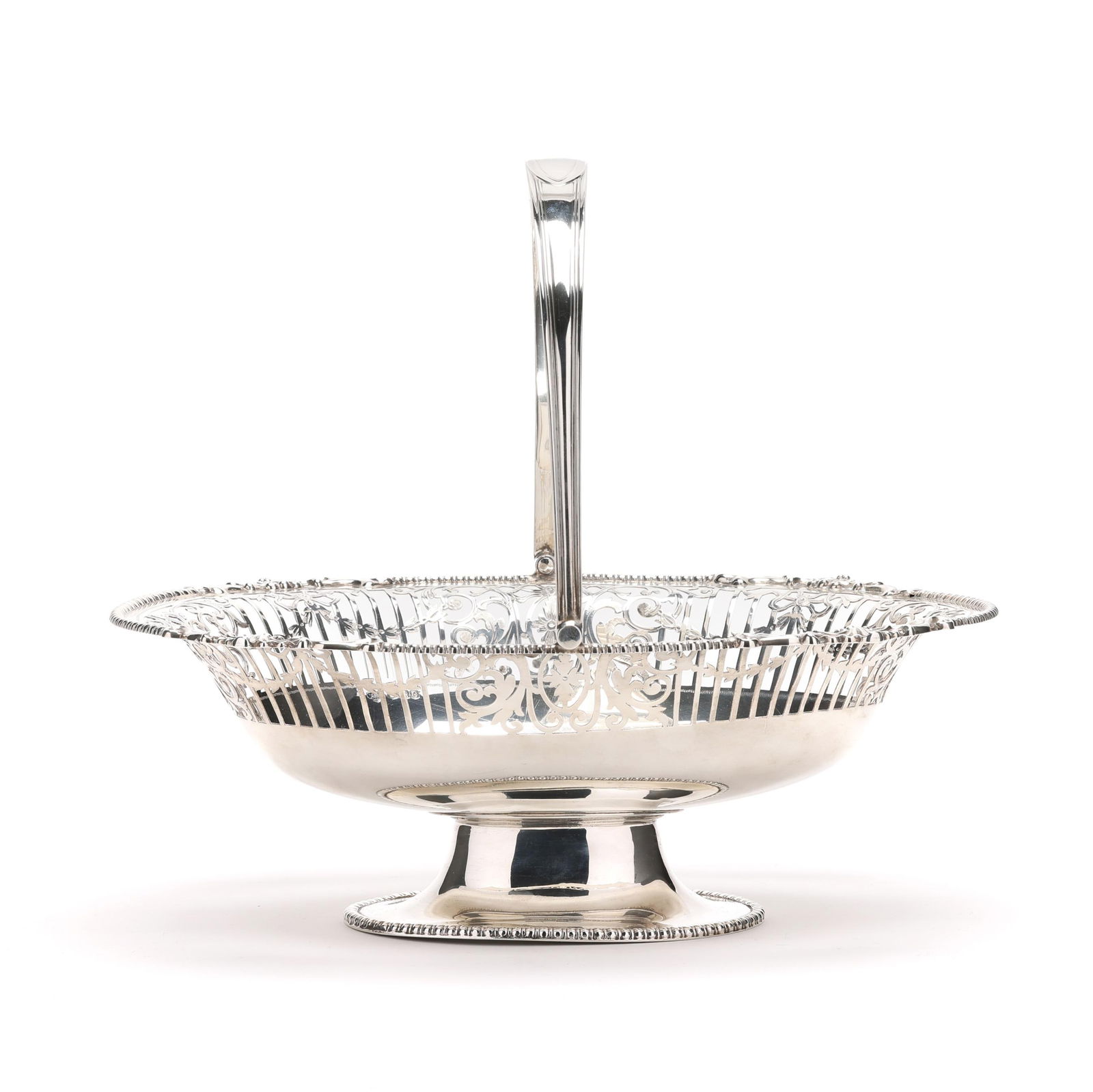 A GEORGE V SILVER CAKE BASKETA