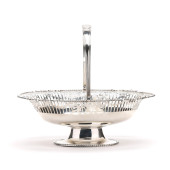 A GEORGE V SILVER CAKE BASKET<