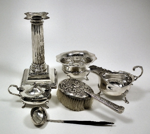 A George V silver candlestick of