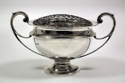 A George V silver circular