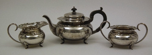 A George V silver circular three
