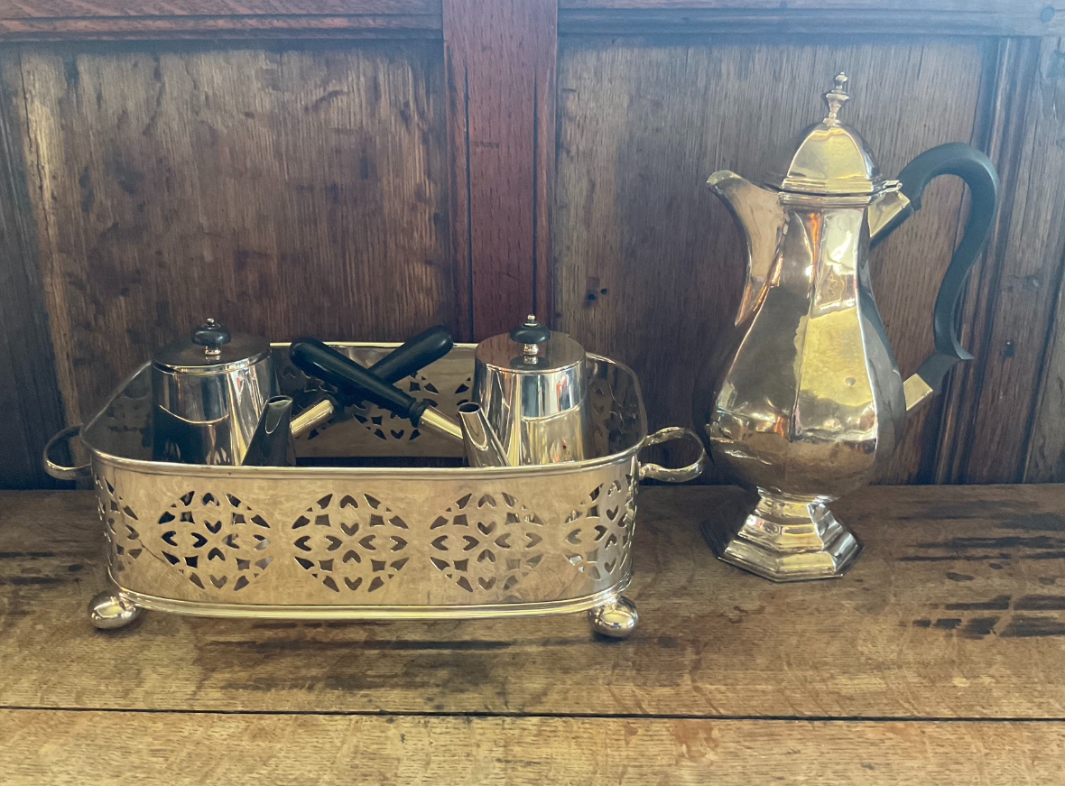 A GEORGE V SILVER COFFEE POT OF