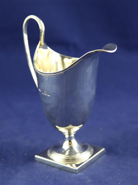 A George V silver helmet shaped