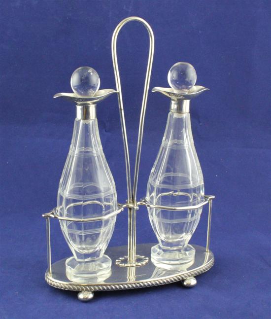 A George V silver oil and vinegar