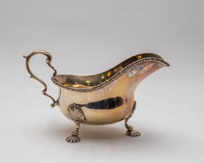 A George V silver sauce boat,