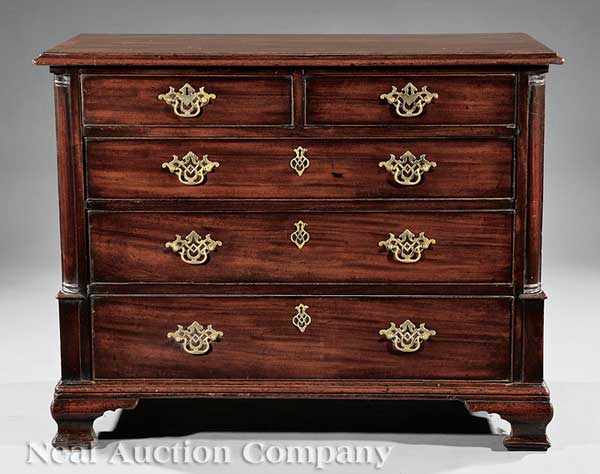 A Georgian Carved Mahogany Chest of