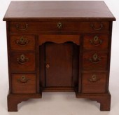 A Georgian mahogany kneehole d