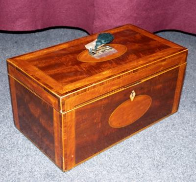 A Georgian mahogany tea caddie,