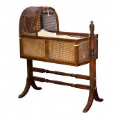 A GEORGIAN ROCKING BABY CRADLE