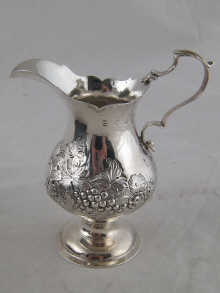 A Georgian silver cream jug with