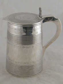 A Georgian silver quart tankard
