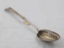A Georgian silver strainer