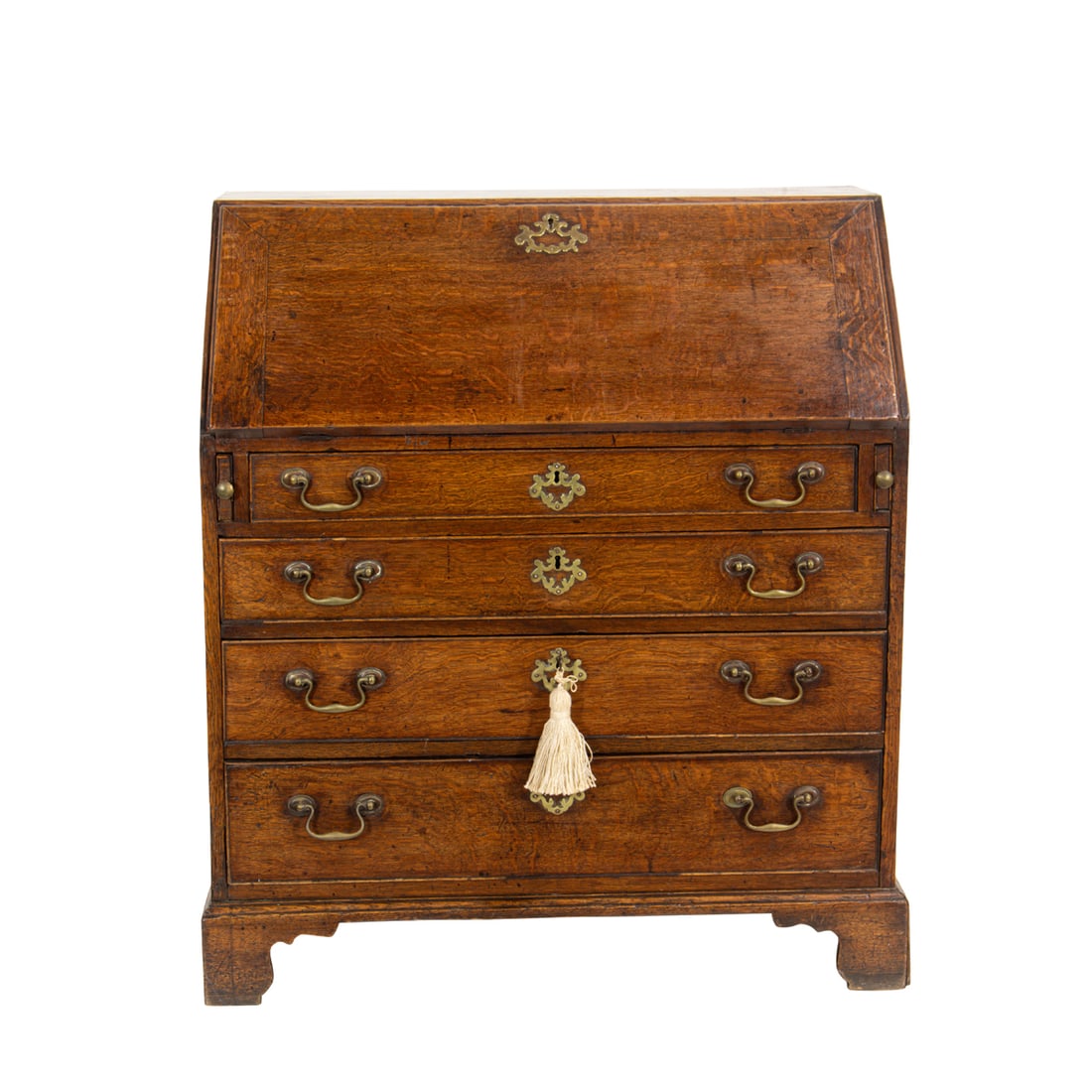 A GEORGIAN SLANT FRONT OAK DESK,